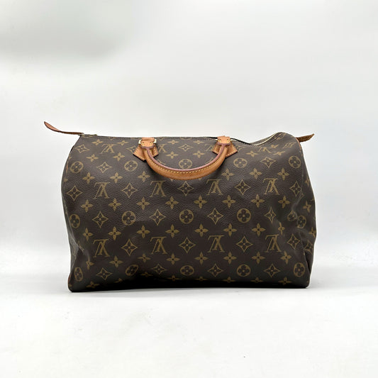 Louis Vuitton Speedy 30 Monogram-Canvas - gegenüberliegende Vorderansicht, Tasche abgestellt