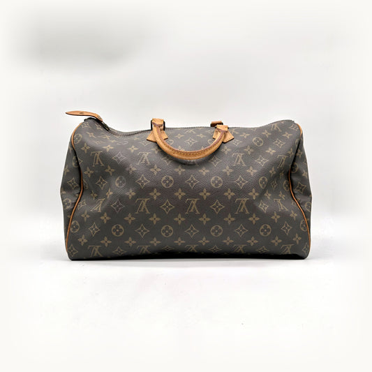 Louis Vuitton Speedy 40 Lona Monogram - vista frontal oposta, mala pousada