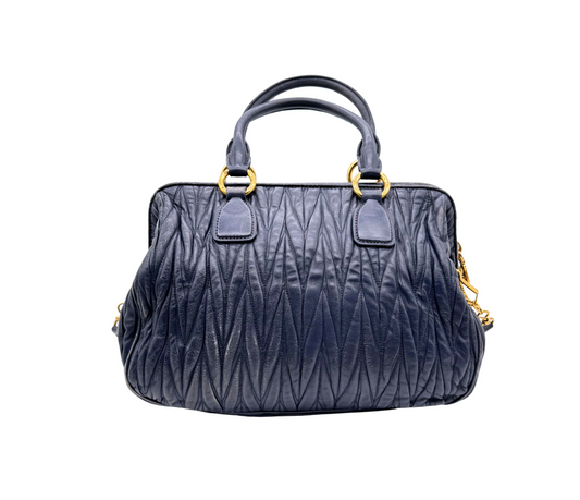 Miu Miu – Mala de mão em pele acolchoada azul