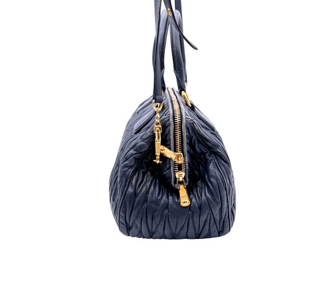 Miu Miu – Sac à main cuir matelassé bleu