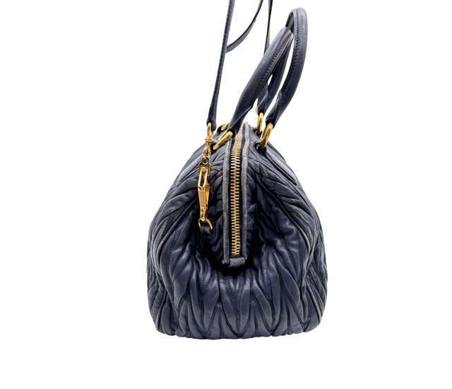 Miu Miu – Sac à main cuir matelassé bleu