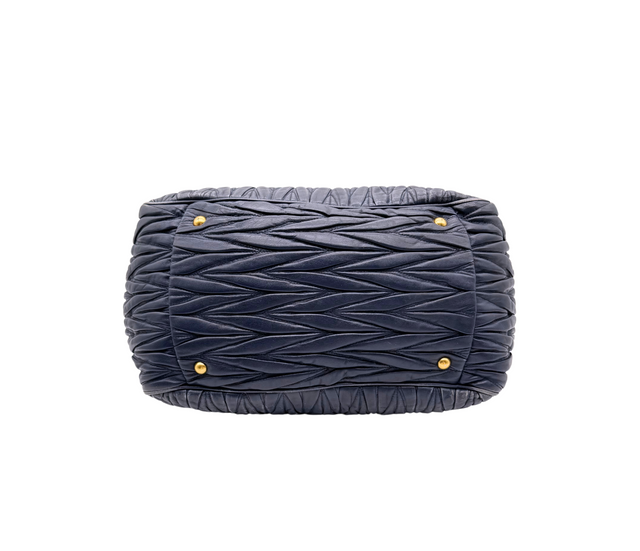 Miu Miu – Sac à main cuir matelassé bleu