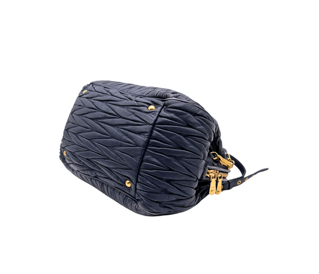 Miu Miu – Sac à main cuir matelassé bleu