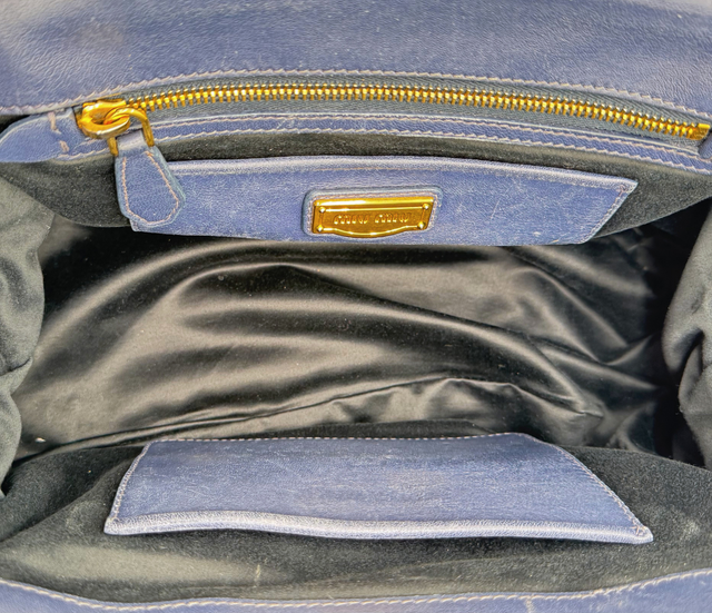 Miu Miu – Sac à main cuir matelassé bleu