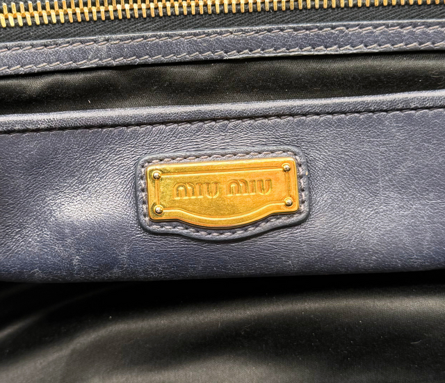 Miu Miu – Sac à main cuir matelassé bleu