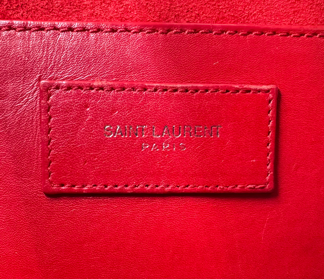 Saint Laurent – Sac Baby Duffle en Cuir Rouge