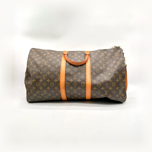 Louis Vuitton Keepall Bandoulière 55 Toile Monogram - vue de face, anses et bande de cuir naturel