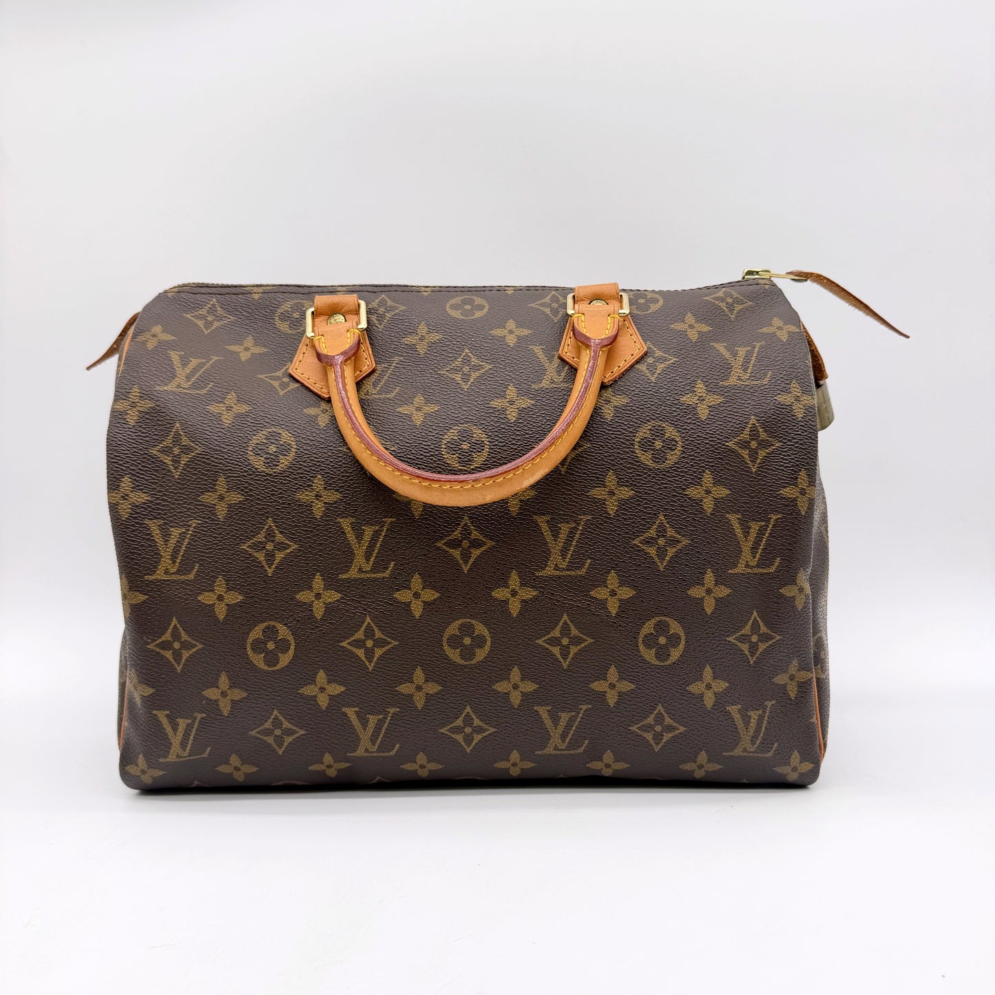 Louis Vuitton Speedy 30 toile Monogram - vue de trois quarts face, anses et zip