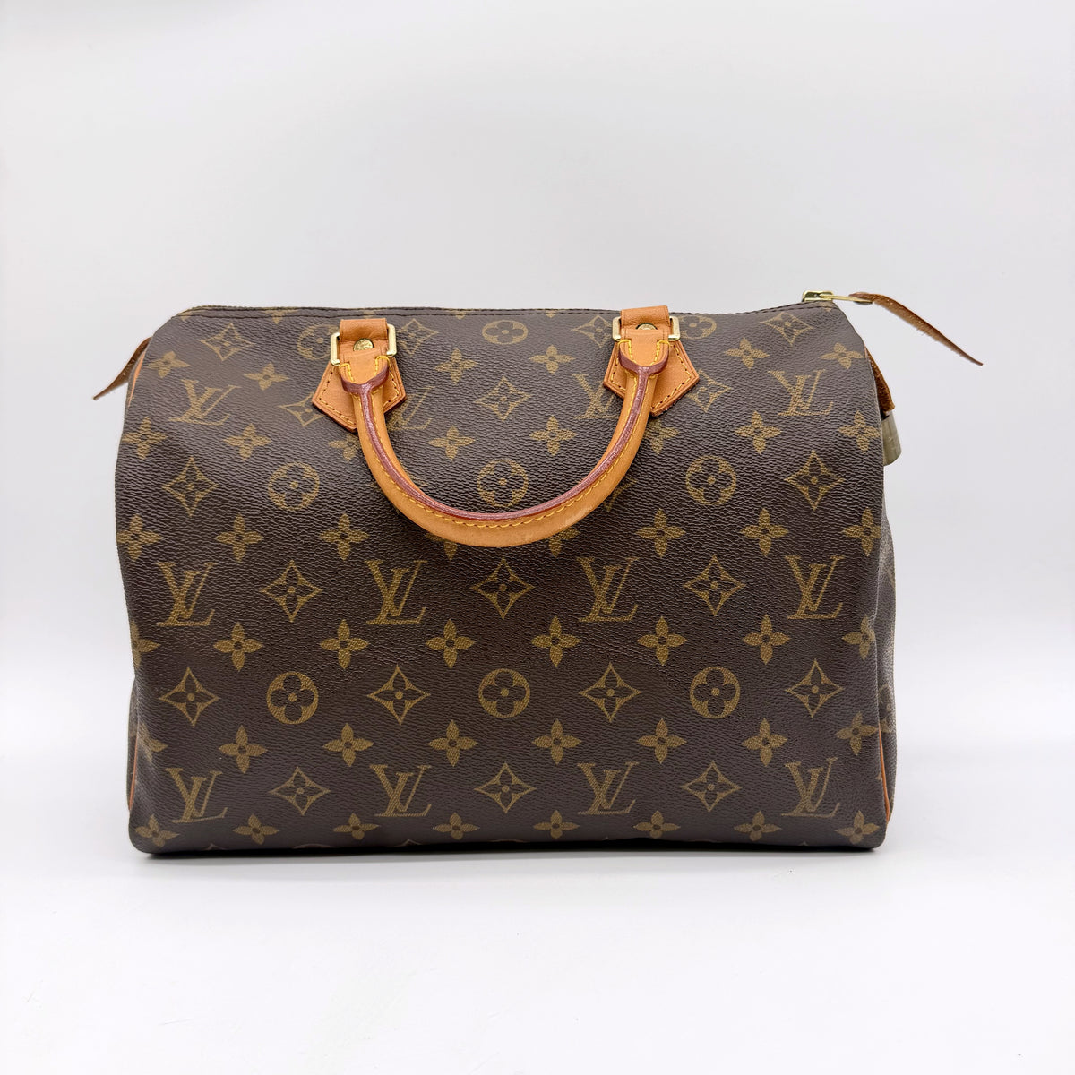 Louis Vuitton Speedy 30 toile Monogram - vue de trois quarts face, anses et zip