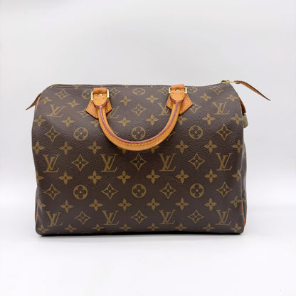 Louis Vuitton Speedy 30 toile Monogram - vue de trois quarts face, anses et zip