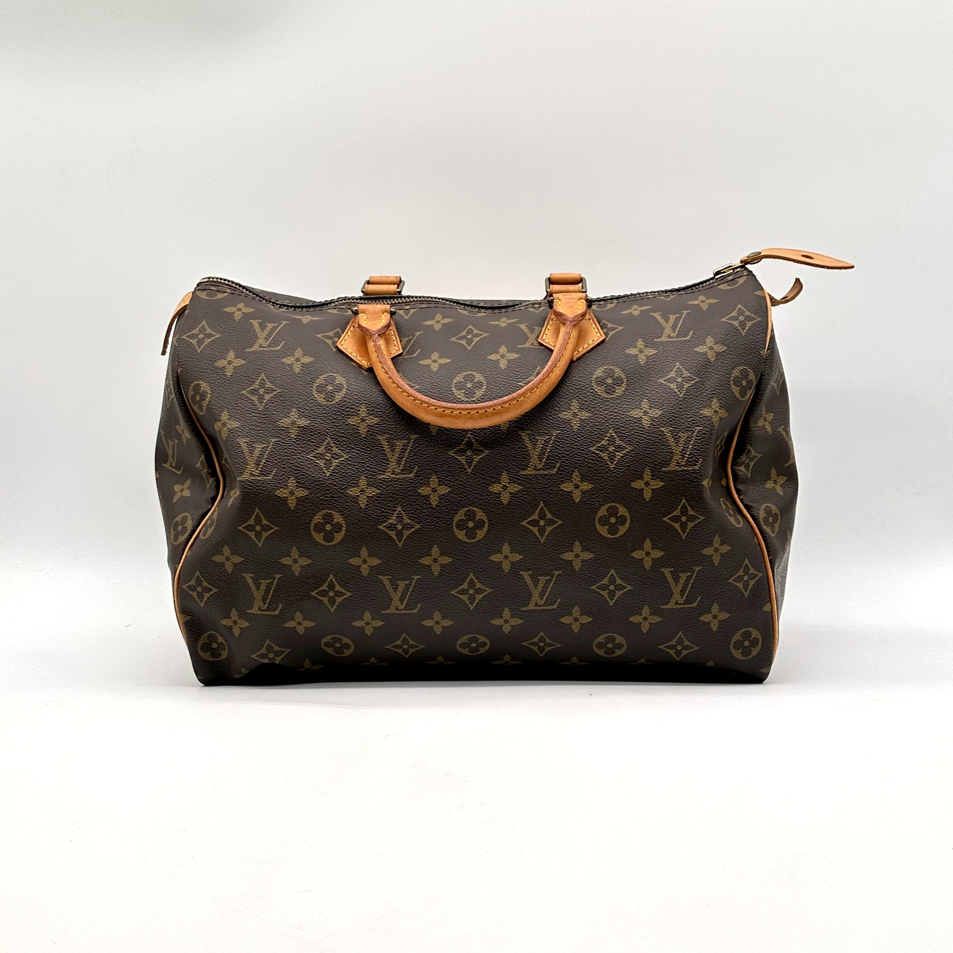 Louis Vuitton Speedy 35 toile Monogram - vue de trois quarts face, anses et zip