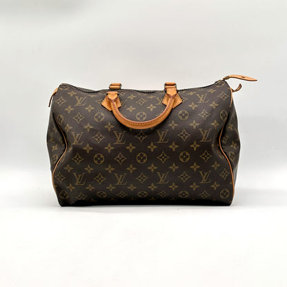 Louis Vuitton Speedy 35 toile Monogram - vue de trois quarts face, anses et zip
