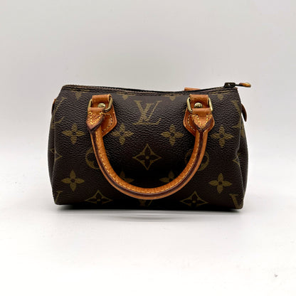 Louis Vuitton Nano Speedy Toile Monogram - vue de face, anses en cuir naturel