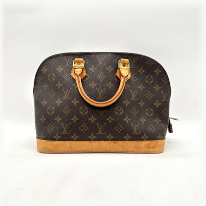 Louis Vuitton Alma Toile Monogram - vue de face, anses et base en cuir naturel