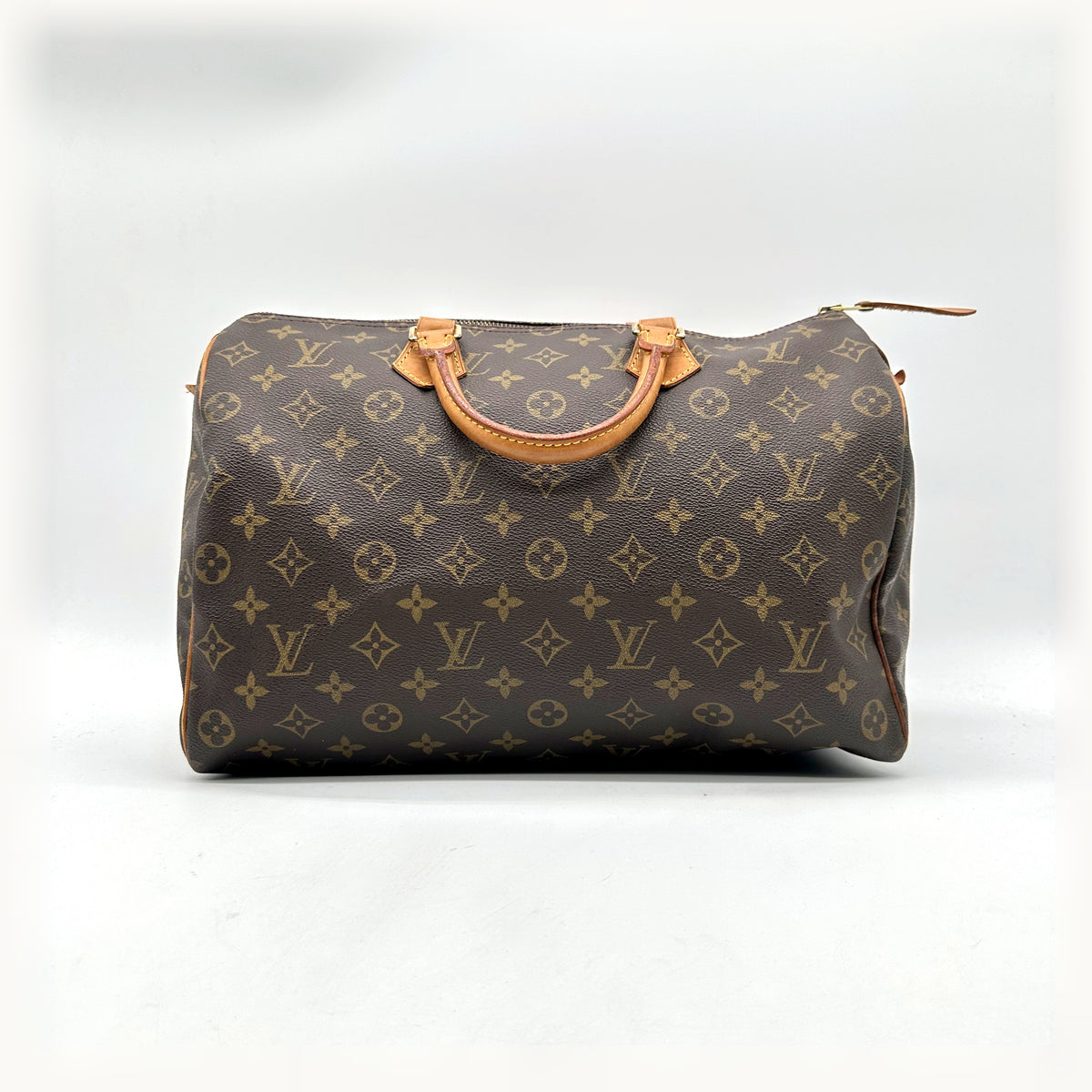 Louis Vuitton Speedy 35 Toile Monogram - vue de face, anses en cuir naturel