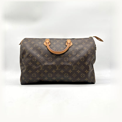 Louis Vuitton Speedy 40 Toile Monogram - vue de face, anses en cuir naturel
