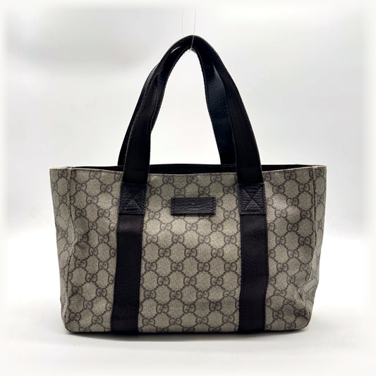 Gucci Tote Toile GG Beige et Cuir Brun - vue de face, anses et plaque de cuir