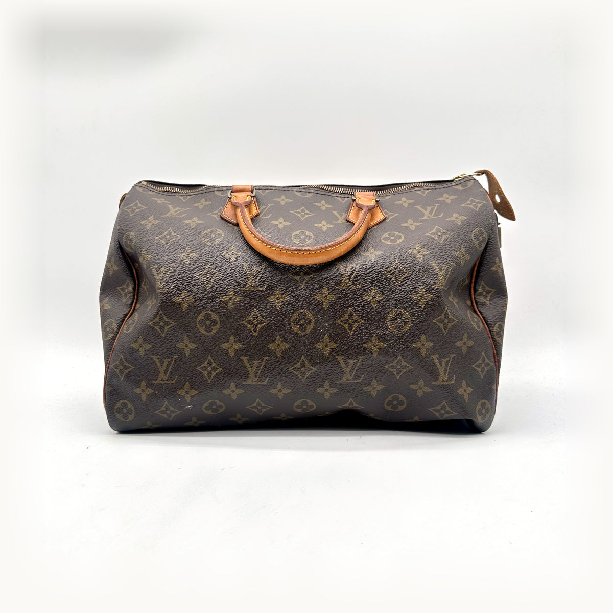 Louis Vuitton Speedy 35 Toile Monogram - vue de face, anses en cuir naturel