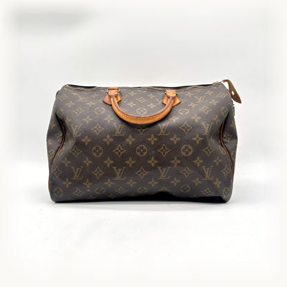 Louis Vuitton Speedy 35 Toile Monogram - vue de face, anses en cuir naturel