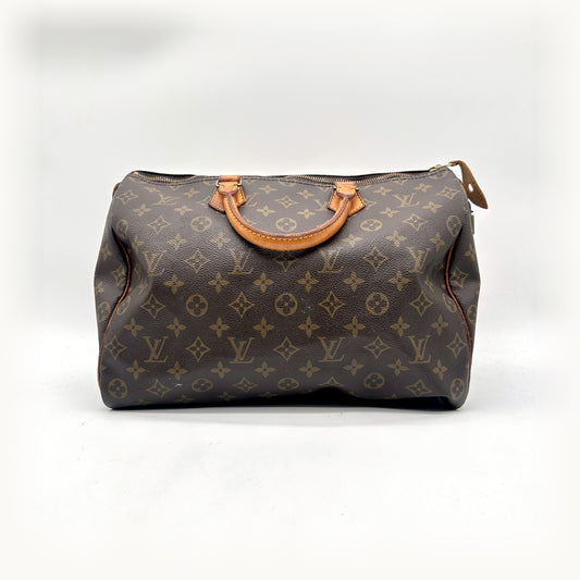 Louis Vuitton Speedy 35 Toile Monogram - vue de face, anses en cuir naturel