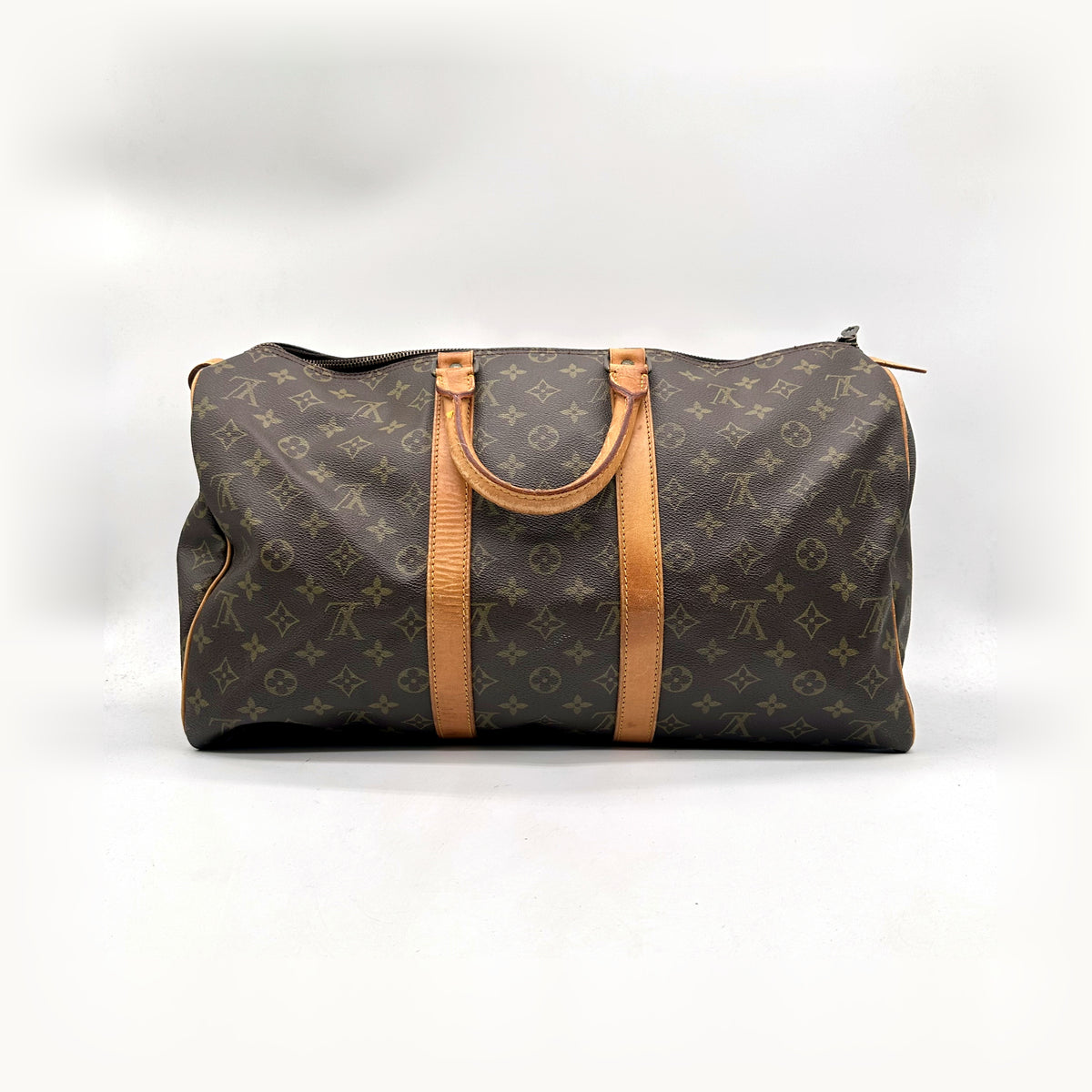 Louis Vuitton Keepall 45 Toile Monogram - vue de face, anses et bande de cuir naturel