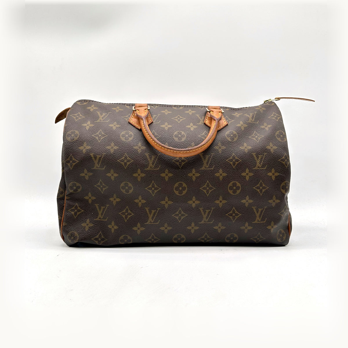 Louis Vuitton Speedy 35 Toile Monogram - vue de face, anses en cuir naturel