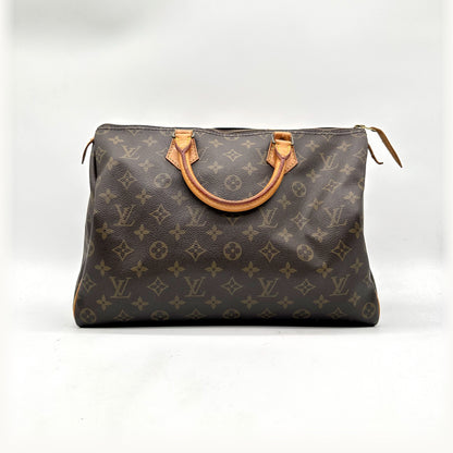 Louis Vuitton Speedy 35 Toile Monogram - vue de face, anses en cuir naturel
