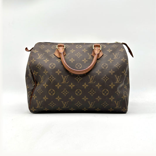 Louis Vuitton Speedy 30 Toile Monogram - vue de face, anses en cuir naturel