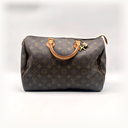 Louis Vuitton Speedy 35 Toile Monogram - vue de face, anses et cadenas