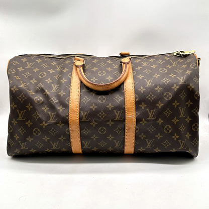 Louis Vuitton Keepall 50 Bandoulière Toile Monogram - vue de face, anses et bande de cuir