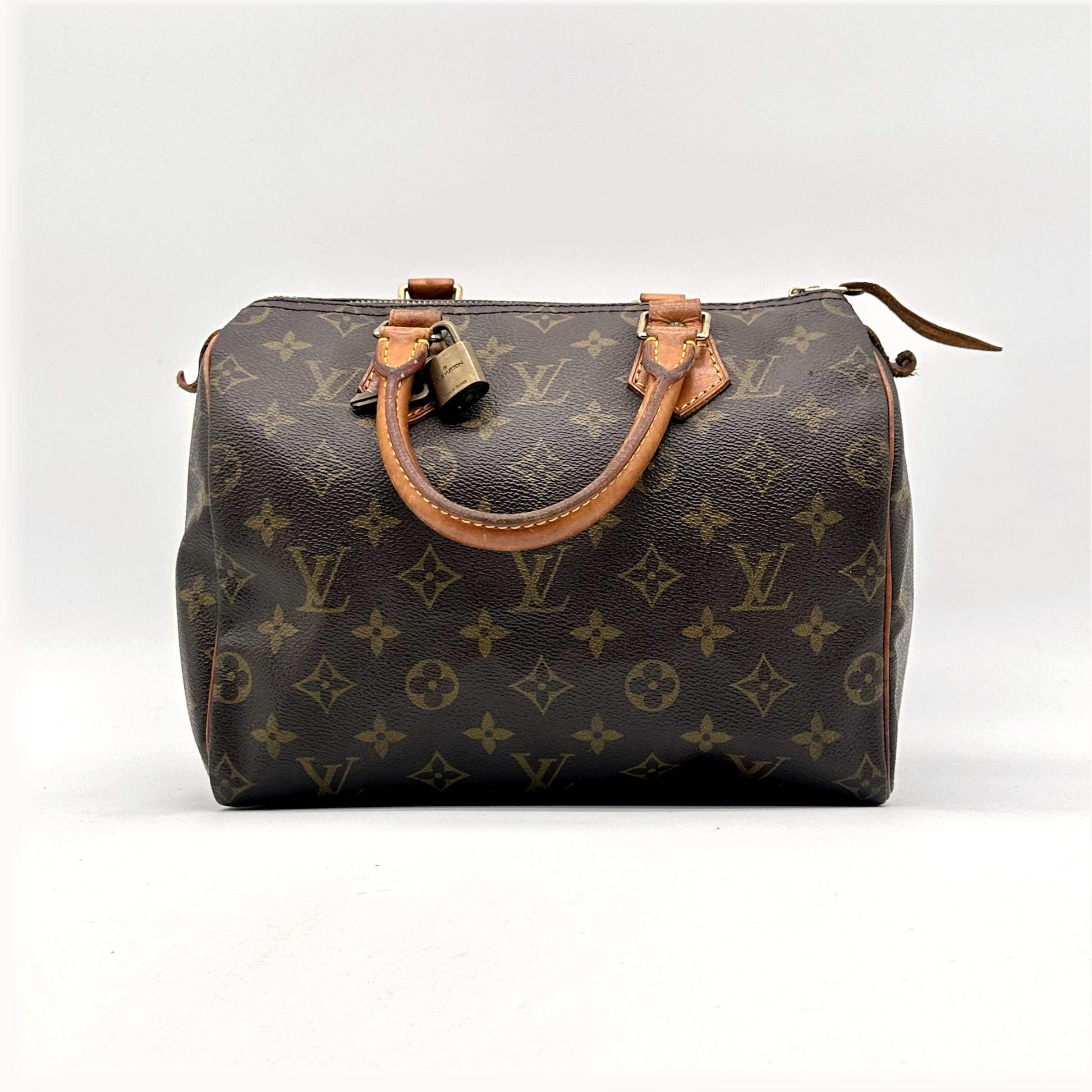 Louis Vuitton Speedy 25 Toile Monogram - vue de face avec le cadenas attaché à l'anse