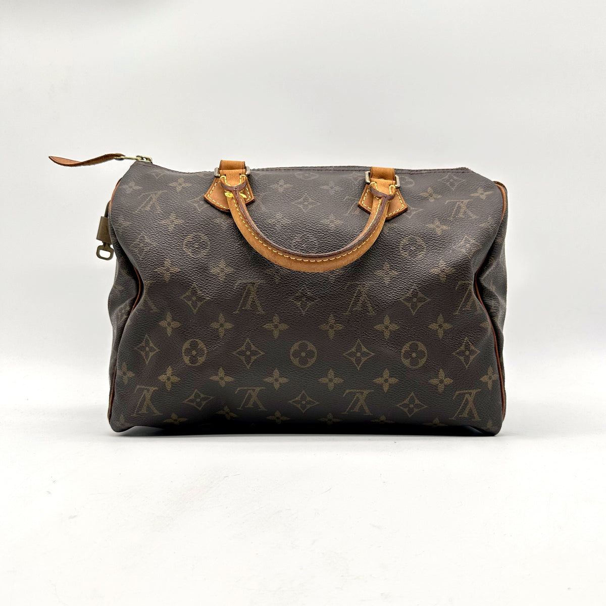 Louis Vuitton Speedy 30 Toile Monogram - vue de face opposée, sac posé