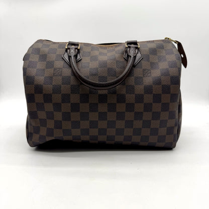 Louis Vuitton Speedy 30 Toile Damier Ebène - vue de face opposée, sac posé