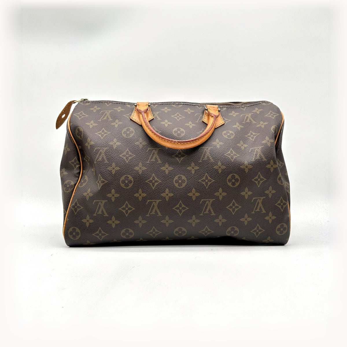 Louis Vuitton Speedy 35 Toile Monogram - vue de face opposée, sac posé