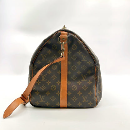 Louis Vuitton Keepall Bandoulière 55 Toile Monogram - vue d'un bout, bandoulière pendante