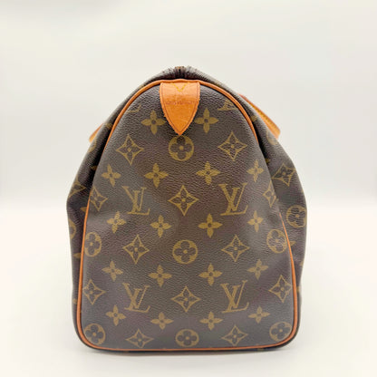 Louis Vuitton Speedy 35 toile Monogram - profil côté estampille