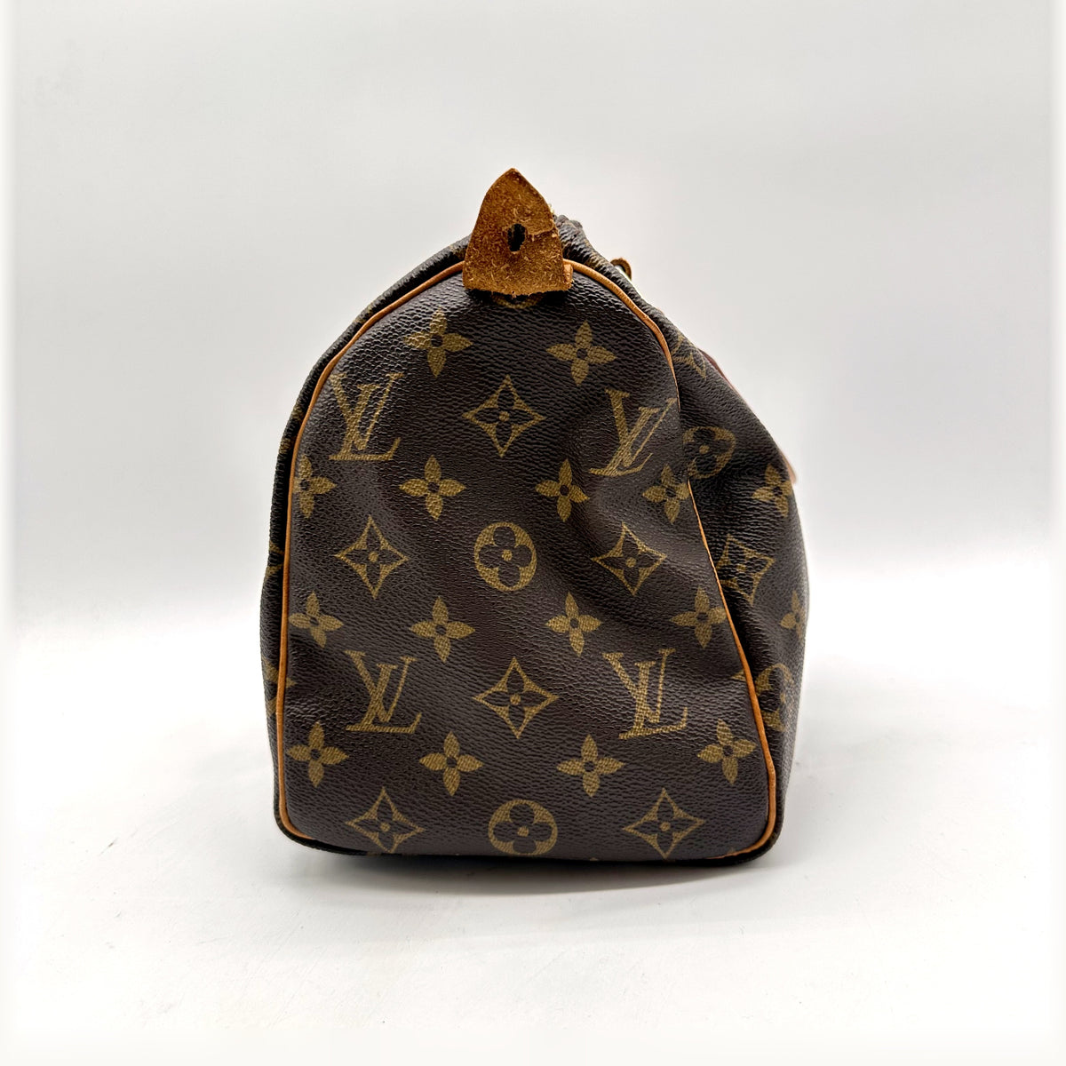 Louis Vuitton Speedy 25 Toile Monogram - vue de profil, flanc arrondi