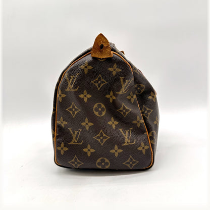 Louis Vuitton Speedy 25 Toile Monogram - vue de profil, flanc arrondi