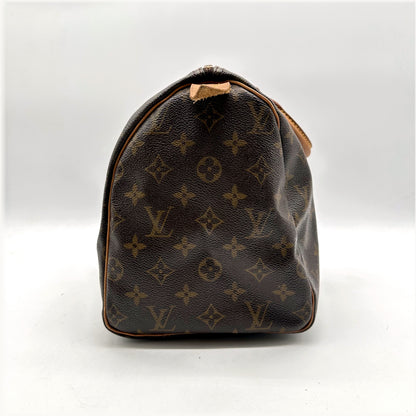 Louis Vuitton Speedy 30 Toile Monogram - vue de profil, flanc arrondi
