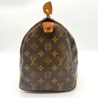 Louis Vuitton Speedy 30 Toile Monogram - côté gauche debout
