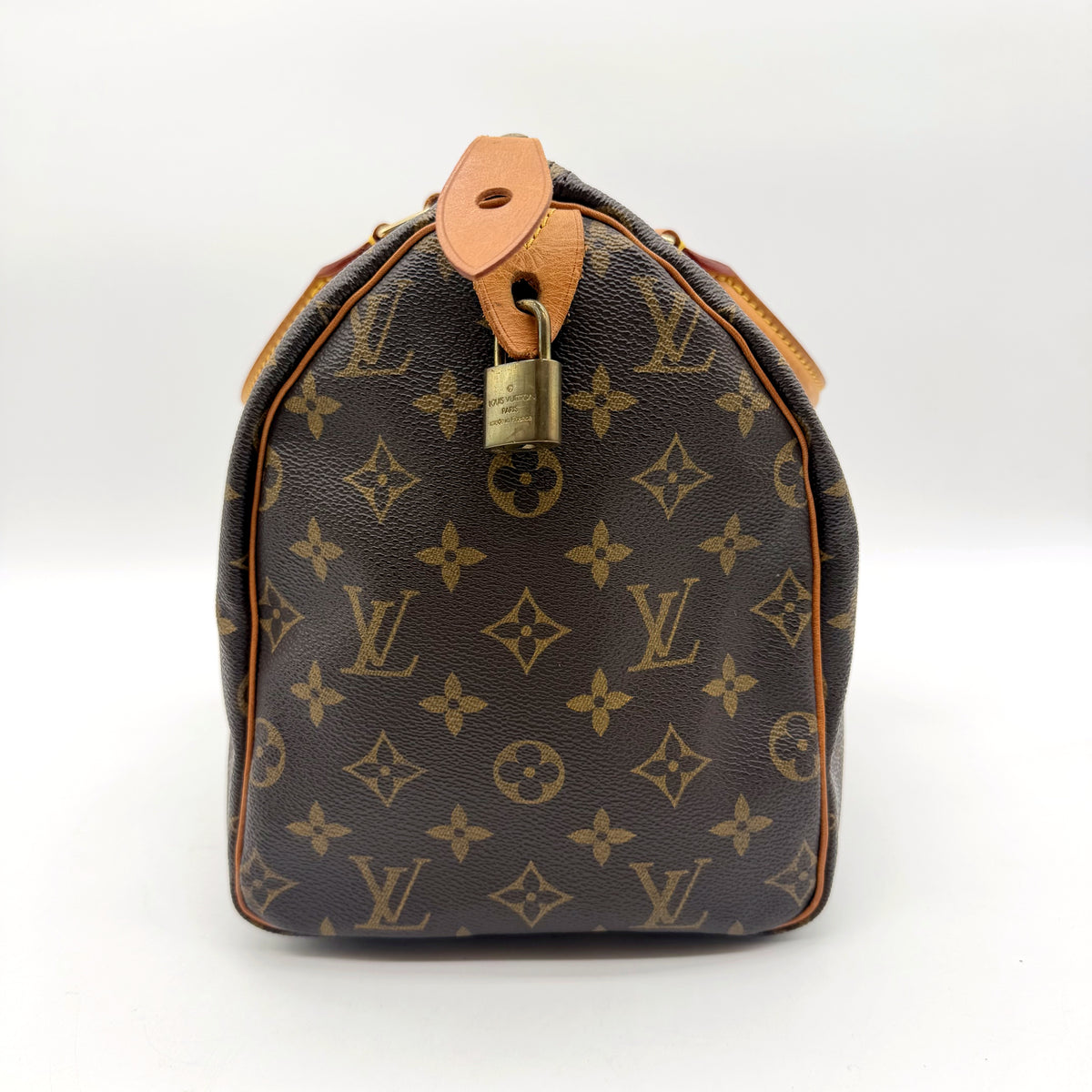 Louis Vuitton Speedy 30 toile Monogram - l'autre extrémité, patte de cuir et cadenas