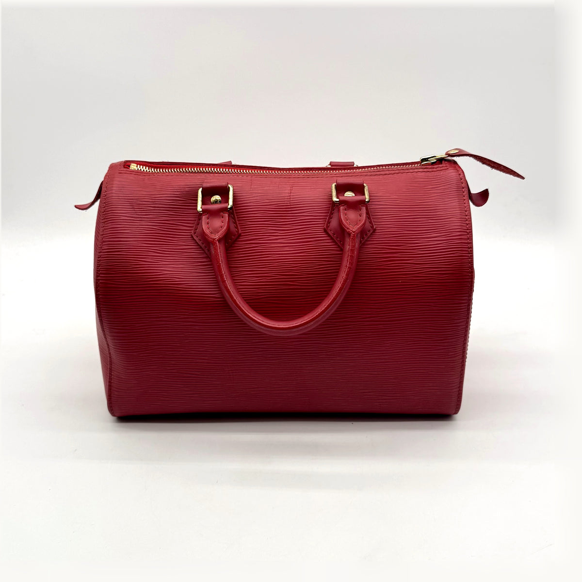 Louis Vuitton Speedy 25 Cuir Épi Rouge - vue de face opposée, sac posé