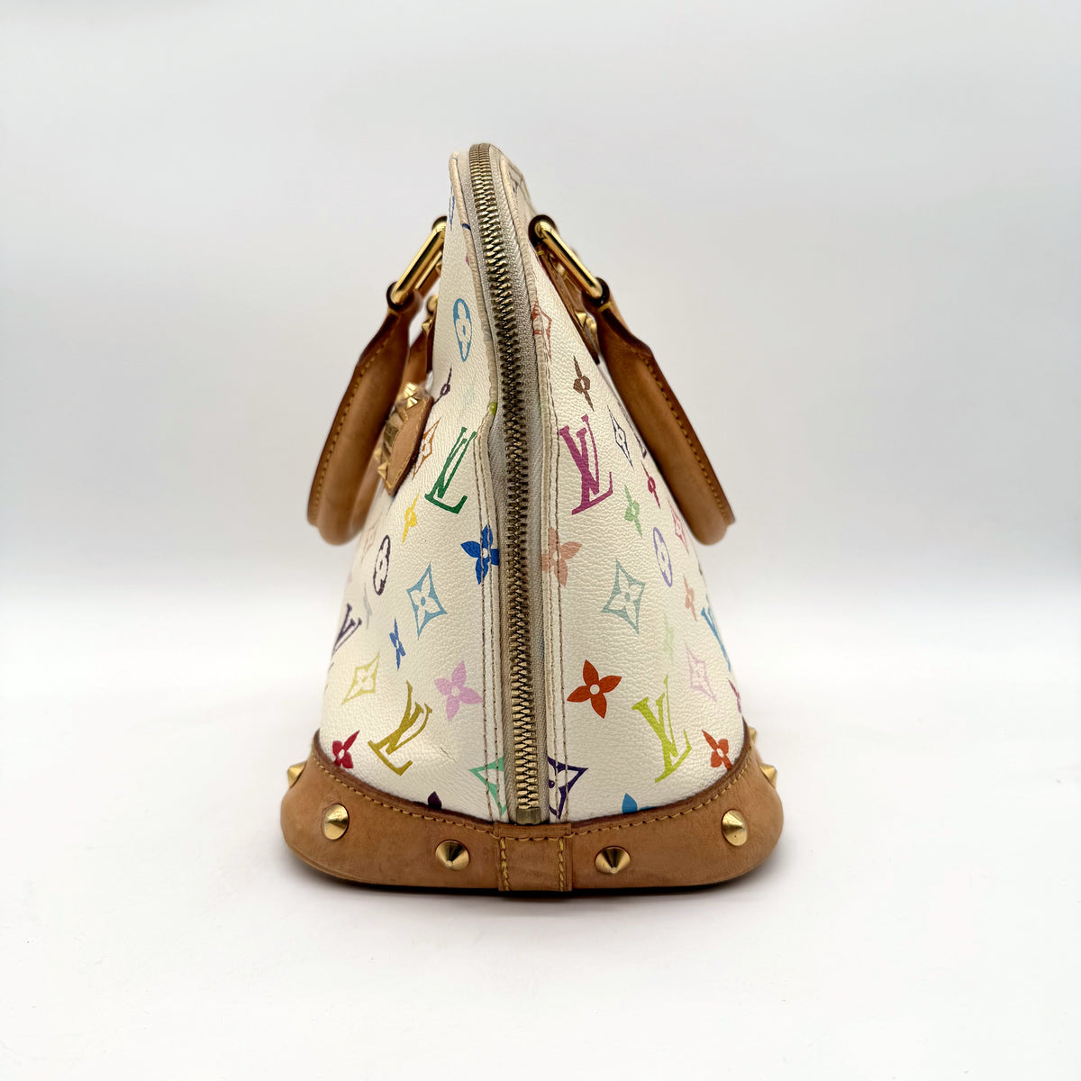Louis Vuitton Alma Toile Monogram Multicolore Blanc - vue de l'autre bout, base cloutée