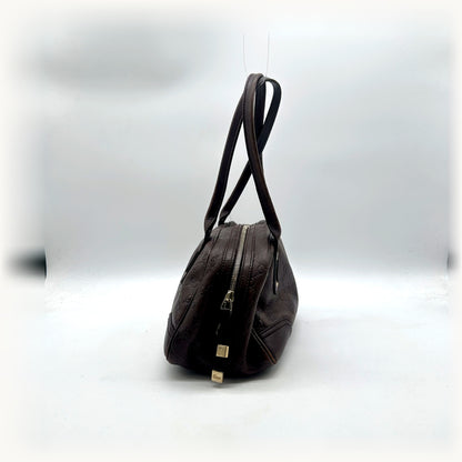 Gucci Bowling Cuir Guccissima Marron - profil opposé, anses relevées