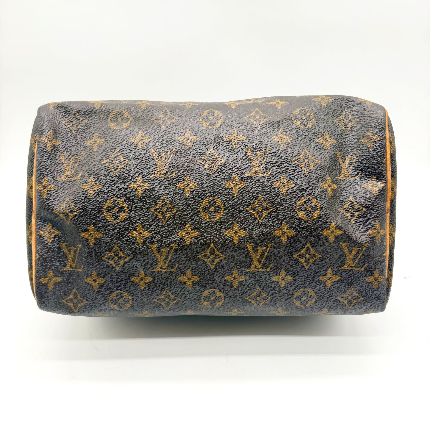 Louis Vuitton Speedy 30 toile Monogram - vue couchée sur le flanc