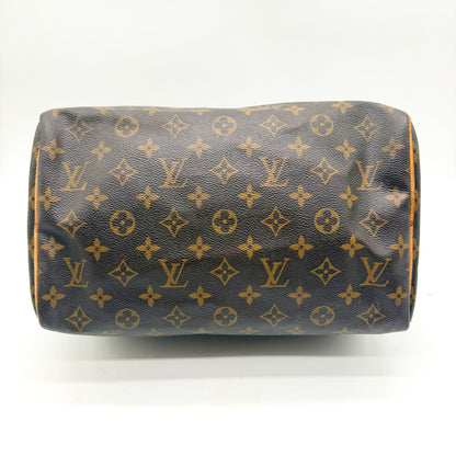 Louis Vuitton Speedy 30 toile Monogram - vue couchée sur le flanc