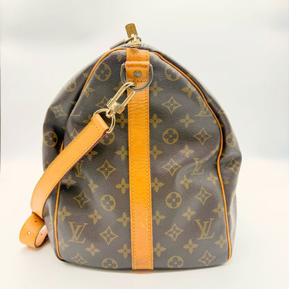Louis Vuitton Keepall Bandoulière 50, profil opposé avec sangle amovible réglable