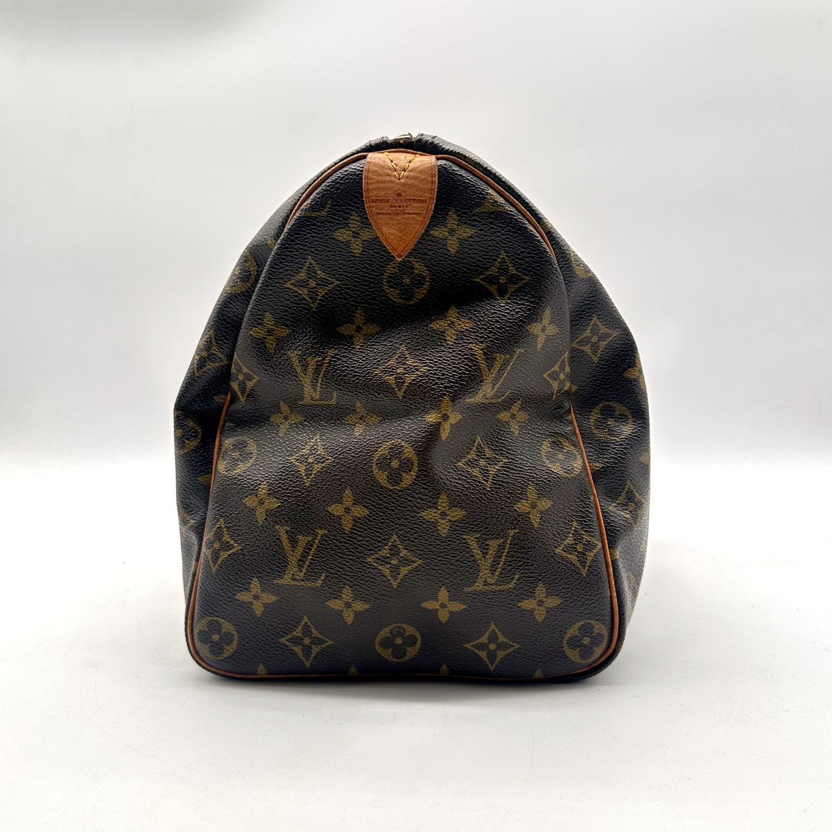 Louis Vuitton Speedy 35 Toile Monogram - côté opposé avec patte en cuir naturel