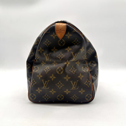 Louis Vuitton Speedy 35 Toile Monogram - côté opposé avec patte en cuir naturel