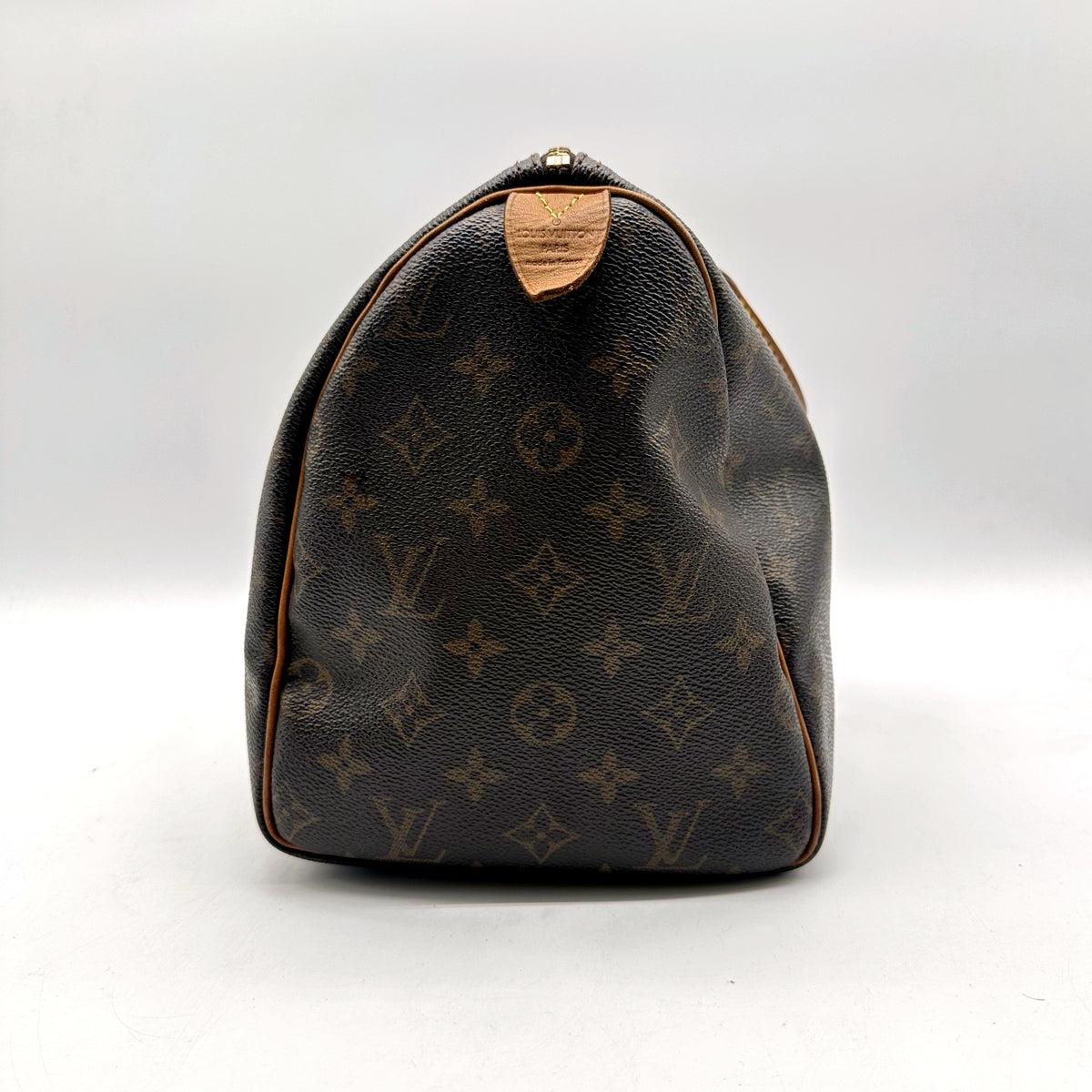 Louis Vuitton Speedy 30 Toile Monogram - côté opposé avec patte en cuir naturel